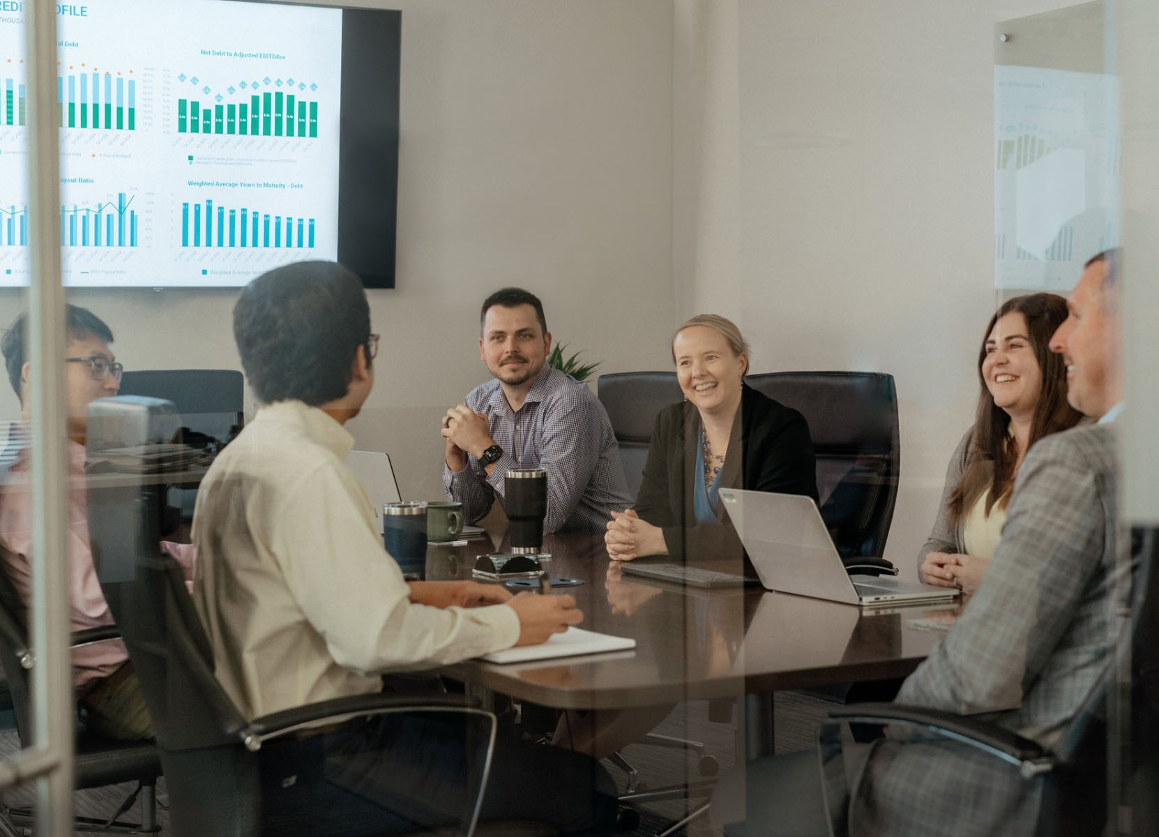 Group of people gathered in office